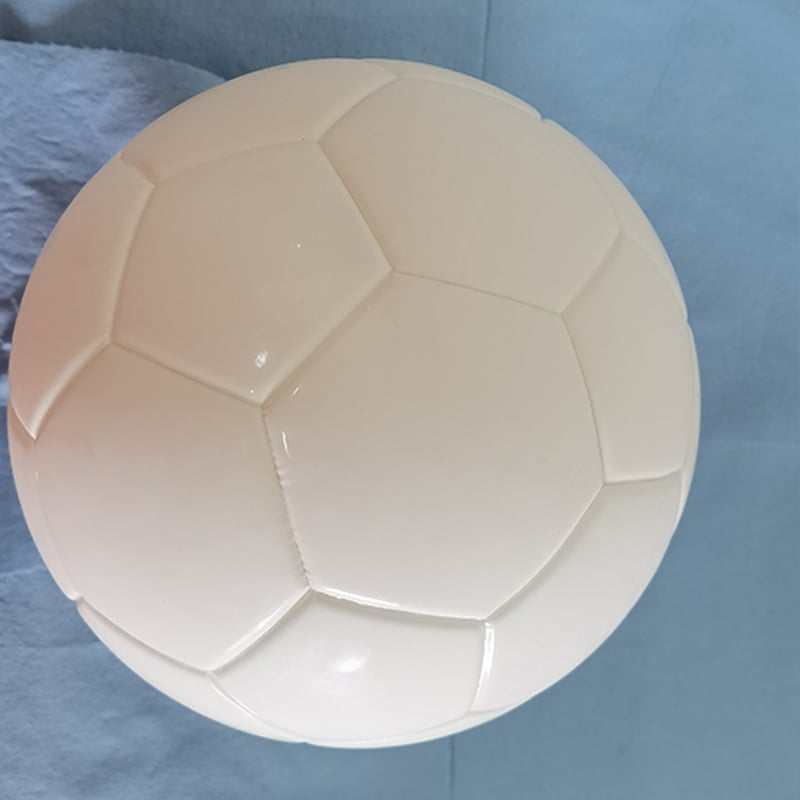 Ballon de football laminé